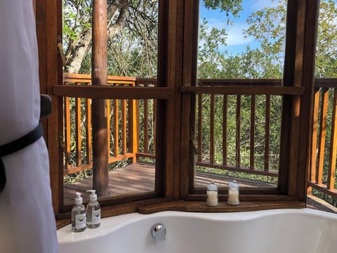 Deluxe Tent | Bathroom | Combined shower/tub, deep soaking tub, free toiletries, hair dryer