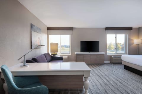 Room, 1 King Bed with Sofa bed | Living area | Flat-screen TV