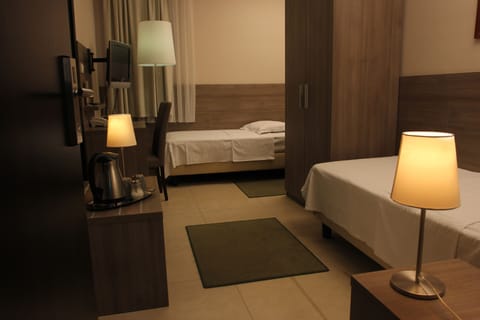 Twin Room, 2 Twin Beds | Minibar, in-room safe, individually decorated, individually furnished