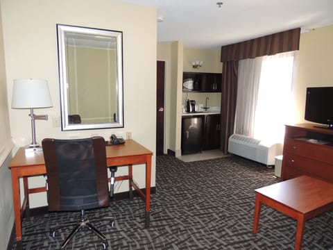 Desk, blackout drapes, iron/ironing board, free cribs/infant beds