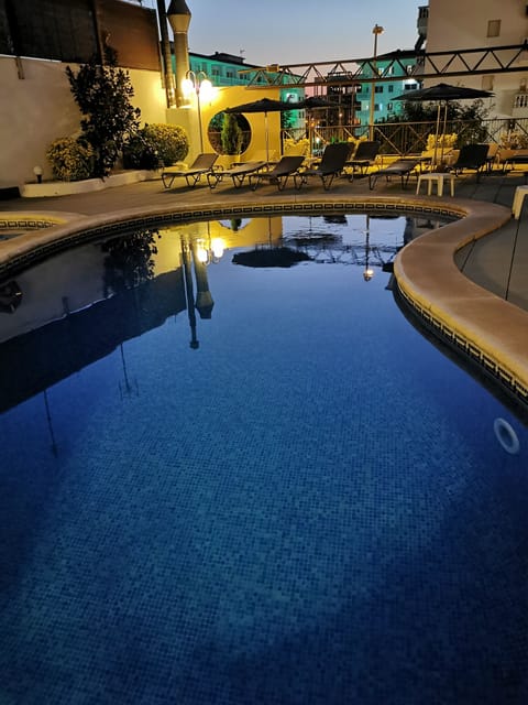 Outdoor pool, open 9 AM to 9 PM, sun loungers
