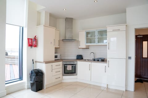 Standard Apartment, 2 Bedrooms | Living area | 40-inch TV with cable channels