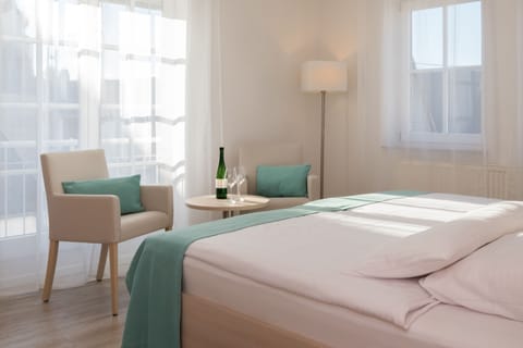 Comfort Triple Room, 1 Bedroom, Non Smoking | In-room safe, individually furnished, blackout drapes, soundproofing