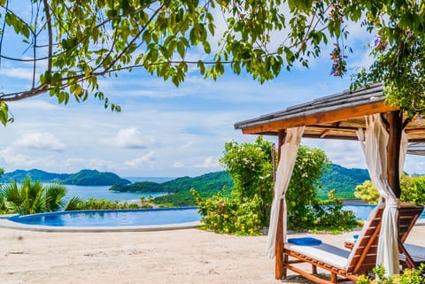 Outdoor pool, pool umbrellas, sun loungers