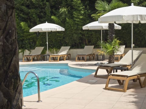 Seasonal outdoor pool, open 7:30 AM to 8:00 PM, sun loungers