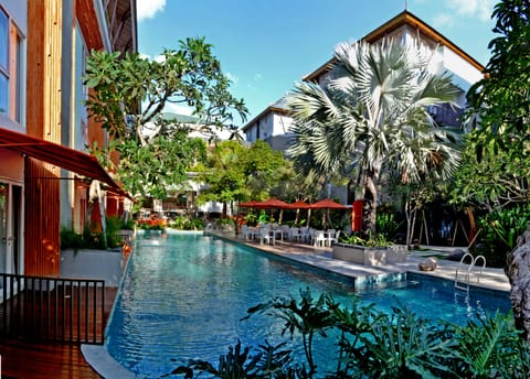 Outdoor pool, open 7:00 AM to 7:00 PM, pool umbrellas, sun loungers
