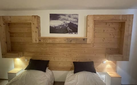 Premium bedding, pillowtop beds, desk, blackout drapes