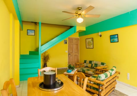 Premium Duplex, 1 Queen Bed | Living area | 30-inch TV with premium channels, pay movies