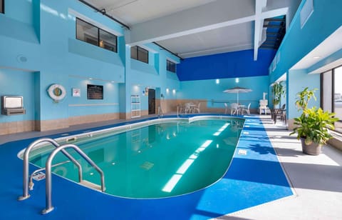 Indoor pool, outdoor pool, open 8:00 AM to midnight, pool umbrellas