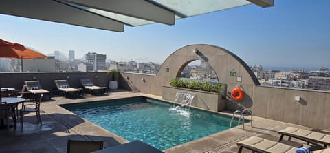 Outdoor pool, pool umbrellas, sun loungers