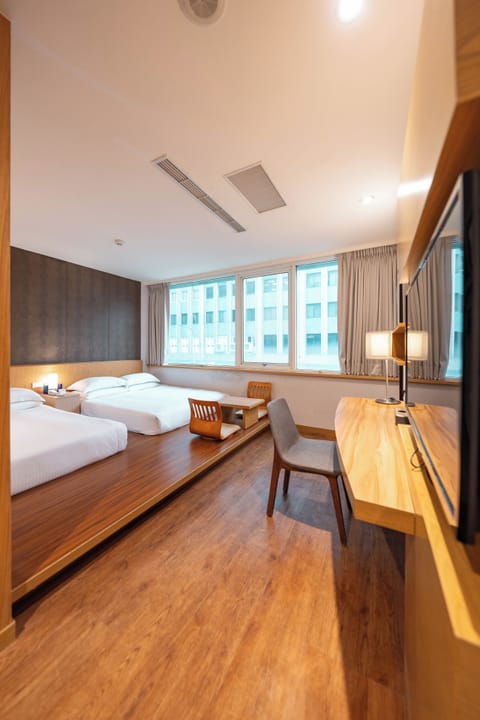 Family Quadruple Room | Free minibar, in-room safe, desk, blackout drapes