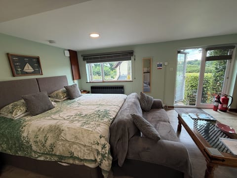 The studio is open plan with large bed and 2 seater sofa 