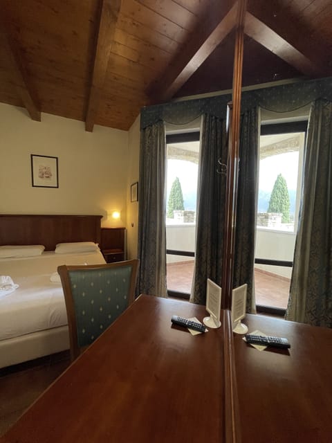 Double Room, Private Bathroom | Minibar, in-room safe, individually furnished, desk