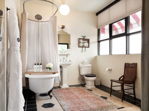 Superior Suite, 1 King Bed, Bathtub | Bathroom | Shower, hair dryer, bathrobes, towels