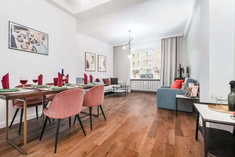 Large table with chairs for eating communal meals. 