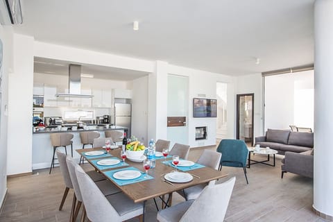 Dining Area with table and chairs to seat 8 persons