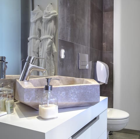 Shower, free toiletries, hair dryer, bathrobes