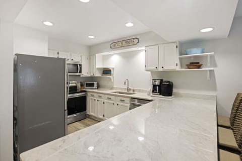 Beautifully upgraded kitchen with stainless appliances