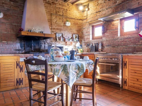 Furniture, Table, Wood, Lighting, Chair, Interior Design, Cabinetry, Kitchen, Countertop, Floor