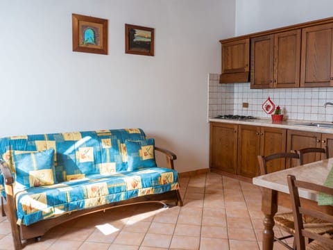 Property, Cabinetry, Furniture, Couch, Table, Lighting, Interior Design, Wood, Studio Couch, Countertop