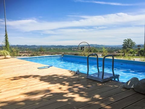 Water, Cloud, Sky, Water Resources, Swimming Pool, Plant, Azure, Shade, Tree, Outdoor Furniture