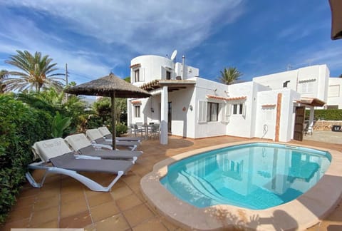 Casa Sol Swimming pool, solarium and living areas.