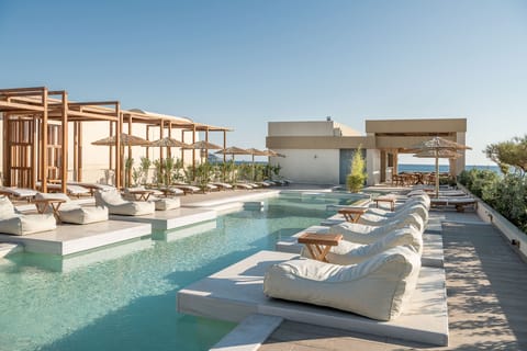 Indoor pool, 4 outdoor pools, open 9:00 AM to 7:00 PM, pool umbrellas