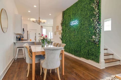 Come together with your guests for meals in our welcoming dining room, complete with a beautiful photo wall.