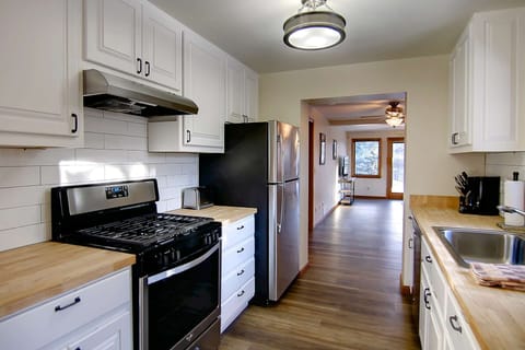 A beautiful updated kitchen stocked with everything you need to make meals in.