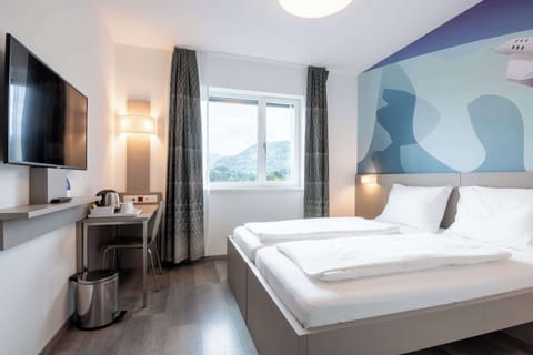 Standard Room, 1 Double Bed (Converts to 2 Twin Beds) | In-room safe, blackout drapes, free WiFi, bed sheets