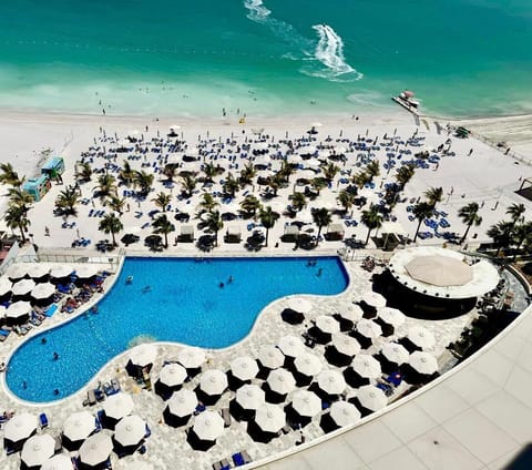 Private beach, white sand, sun loungers, beach umbrellas