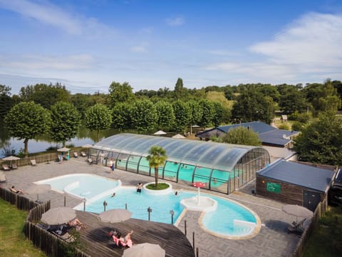 Indoor pool, seasonal outdoor pool, pool umbrellas, sun loungers
