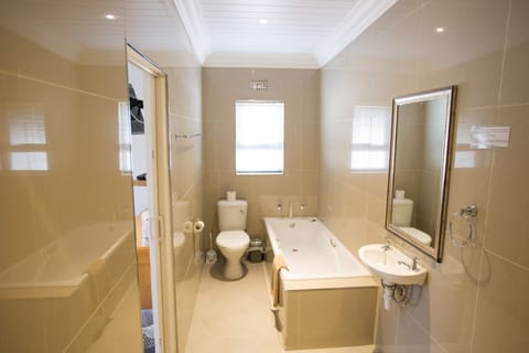 Family Room, 1 Bedroom | Bathroom | Separate tub and shower, hair dryer, towels, soap