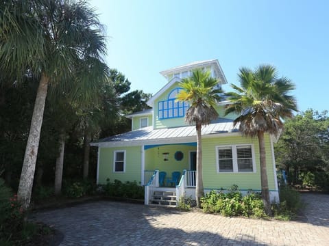 Private home in gated community with charm, style and lots of parking