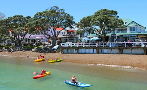 On the beach, kayaking