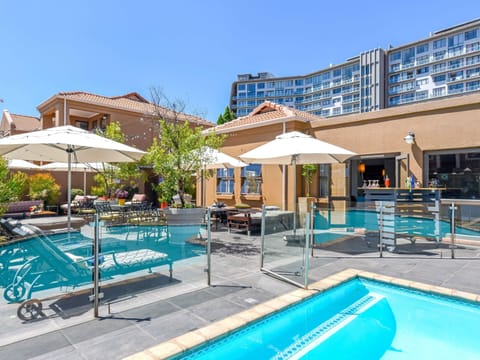 Outdoor pool, pool umbrellas, sun loungers