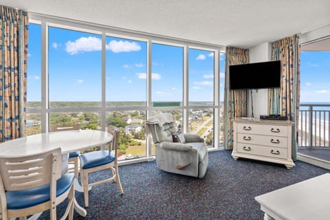 Ocean views fill the living area at Avista Ocean Resort 1514, a 1-bedroom Ocean Drive condo from Thomas Beach Vacations