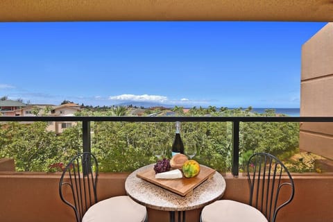 Private balcony with stunning ocean views, perfect for enjoying breakfast or evening drinks in paradise
