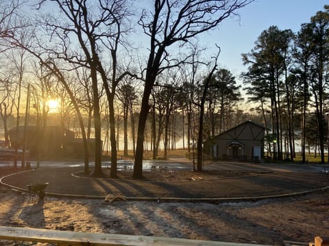 Great view of sunrise and large circular drive. 