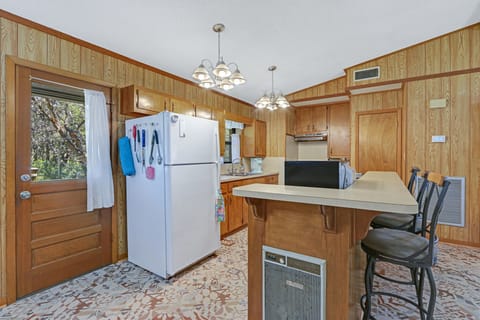 The kitchen has bar seating.