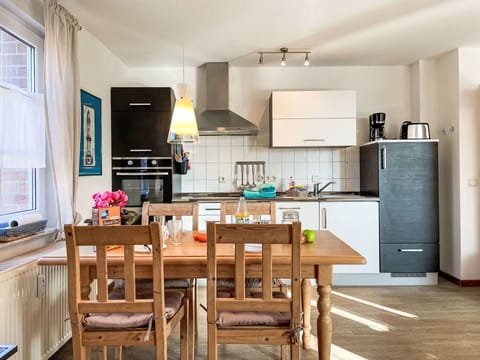 Furniture, Kitchen, Interior Design, Flooring, Kitchen Appliance, Chair, Floor, Cabinetry, Wood, Countertop