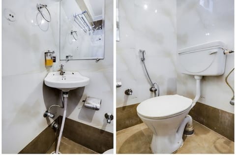 Deluxe A/C Room | Bathroom | Shower, towels