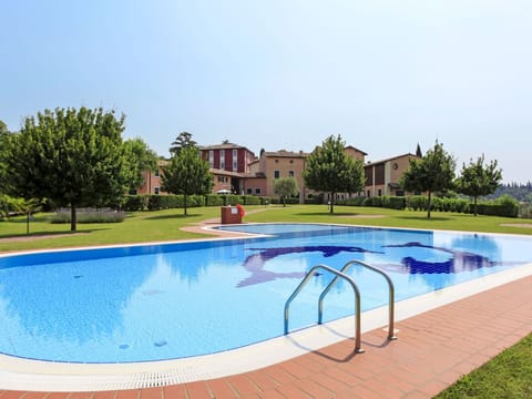 Water, Sky, Plant, Swimming Pool, Tree, Rectangle, Building, Outdoor Furniture, Shade, Leisure