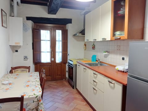 Family Apartment, 2 Bedrooms (Mimosa) | Private kitchen | Full-size fridge, stovetop, highchair, cookware/dishes/utensils