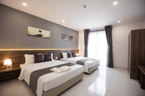 Family Room, Balcony | Hypo-allergenic bedding, minibar, in-room safe, desk