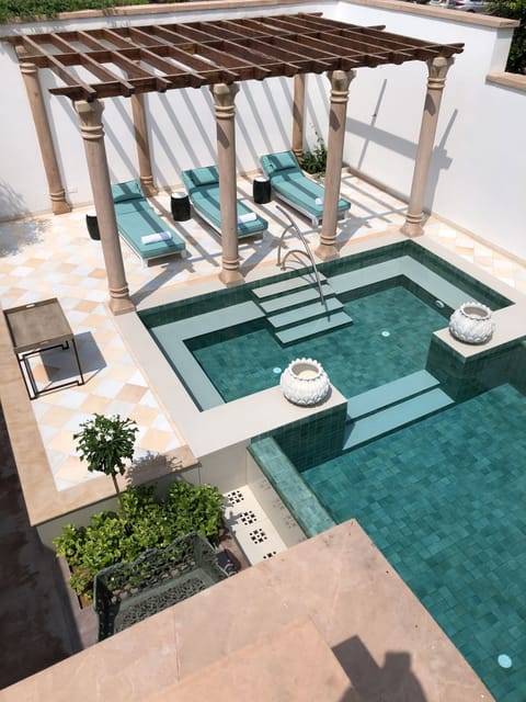 Indoor pool, open 8:00 AM to 7:00 PM, sun loungers