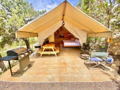 Glamping Tent 7 at East Zion Resort has 2 queen beds and a camping cot making it one of our best family friendly accommodations.  Conveniently located between Zion and Bryce Canyon National Parks, it's the perfect basecamp for your next adventure!