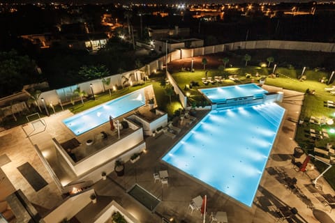 2 outdoor pools, open 8:00 AM to 8:00 PM, pool umbrellas, sun loungers