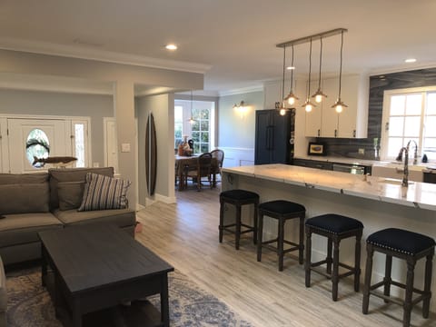 Looking from Hallway back to Entry, Kitchen, Family Room and Nook