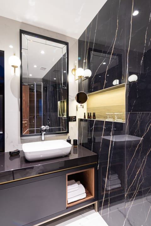 Shower, free toiletries, hair dryer, bathrobes